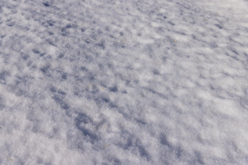 a large amount of snow in snowdrifts in winter
