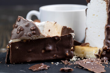 Fresh sweet cake with milk taste and aroma in chocolate glaze