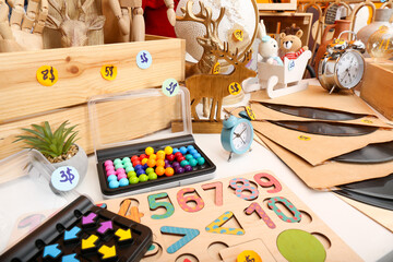 Many different stuff on white table. Garage sale