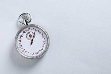 Vintage timer on light grey background, top view with space for text. Measuring tool