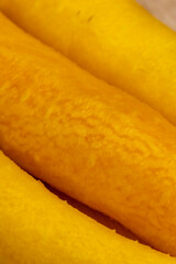 Pieces of sliced peeled carrots are yellow