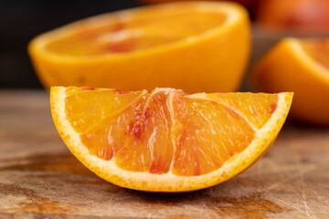 sliced orange with yellow-red juicy flesh