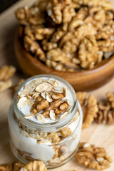 Fresh delicious yogurt made from milk with walnuts
