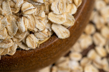 Oat flakes poured on the kitchen table