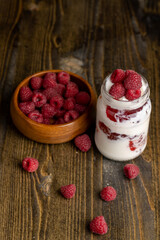 Fresh milk yogurt with whole fresh raspberries