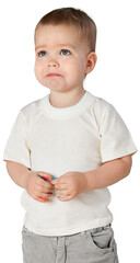 Young boy playing with his finger and looking sad
