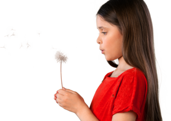 Young girl holding a dandelion blowball