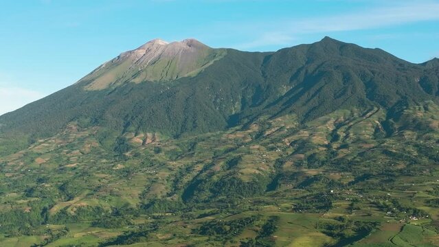 Aerial drone of Canlaon volcano and farmland on the mountain slopes. Negros, Philippines