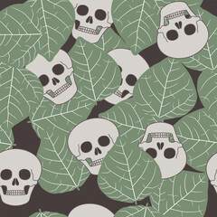 Seamless abstract pattern with human skulls and tree leaves. 