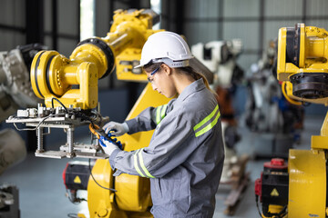 Robotic technicians tighten and loosen components with screwdriver and plier to perform safety maintenance. Measuring current, voltage, resistance, capacity, temperature with digital clamp meter.