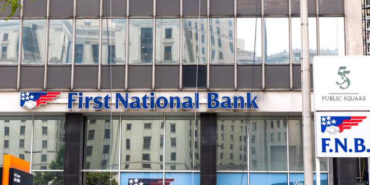 Sign and logo of First National Bank on the building in Cleveland, Ohio. As of 2022, FNB has total assets of nearly $44 billion, head quartered in Pittsburg.