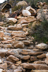 Up a rugged pathway of sandstone steps, leading to a mountain wildnerness
