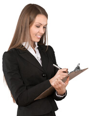 Young Businesswoman Writing on Clipboard - Isolated