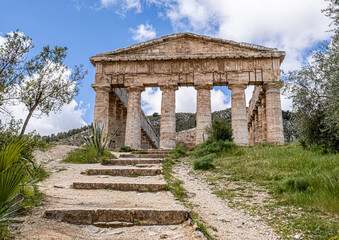 Fototapeta na wymiar View of the well-preserved Doric Temple of Segesta, located outside the site of the ancient city of Segesta, Province of Trapani, Sicily, Italy 