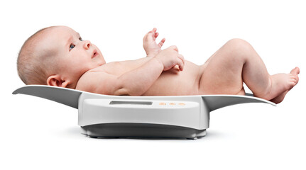 Little baby on weight scale. Baby Healthy concept