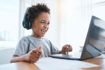 Learning, laptop and headphones of child for online education, language translation and writing in...