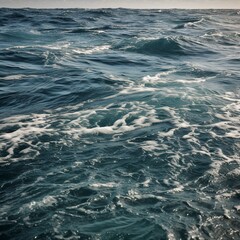 Close-up view of ocean waves blue water background.