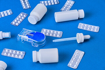 Hair Loss Treatment Medicines on Blue Background