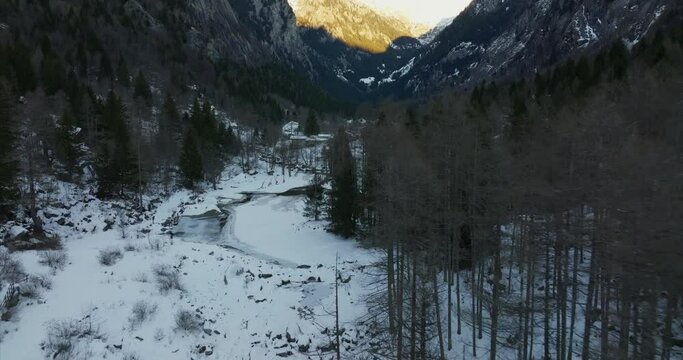  Aerial Snow Covered Landscape In Val Di Mello Valley Forest. Dolly Forward 