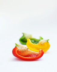 Vegetables or fruits, bell peppers and in studio or white background. Closeup nutrition or diet, vegetarian and salad meal with different colors for health or food commercial or advertisement