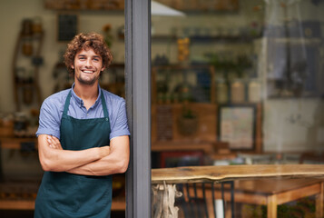 Welcome, arms crossed and portrait of man at restaurant for small business, coffee shop and waiter. Entrepreneur, happy and smile with male barista at front door of cafe for diner and food industry