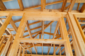 wooden beams inside the house under construction. roof construction.