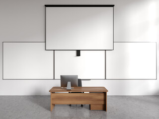 White college classroom with projection screen and whiteboards