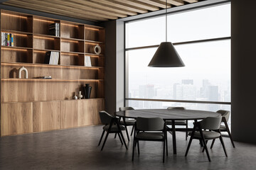 Gray office meeting room with bookcase