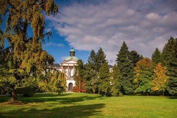 Colorful autumn day in the park. Topolcianky - Nice castle in Slovakia The beauty of nature with and old castle