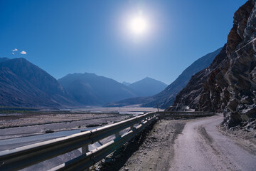 road with two sides are high mountains, and blue sky. Beautiful scenery on the way to pangong lake, Leh, Ladakh, Jammu and Kashmir, India - obrazy, fototapety, plakaty