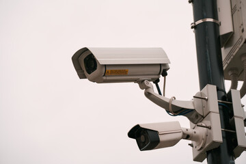 White security camera. CCTV surveillance cam.