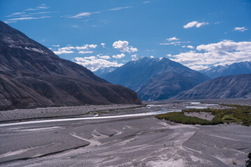beautiful scenery, the river flows between the foothills of the mountains in the valley at ladakh, India