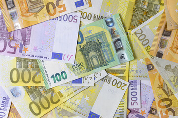 Euro banknotes,various denomination. table top view. Close-up