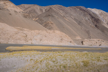 beautiful scenery, the river flows between the foothills of the mountains in the valley at ladakh,...