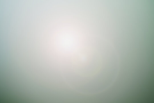 Abstract shiny spotlight background with copy space. Sun and sky backdrop with light flare. Illustration concept for graphic design, banner, poster, website, presentation or wallpaper.