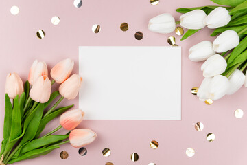 Fototapeta na wymiar pink and white tulips on a pastel pink background with gold glitters on a background with a copy space for your text, spring flatlay composition for invitation, promotion, banners, card
