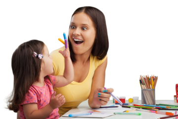 Happy young mother and daughter painting