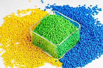 color dye for plastic granules in yellow, blue and green. material for polymer production. chemical...