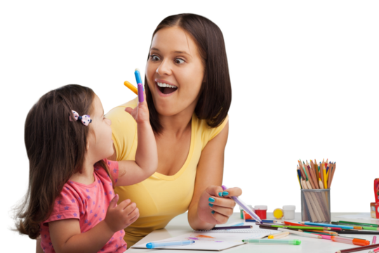 Happy young mother and daughter painting
