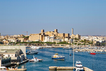 Fototapeta na wymiar Scenic view of port of City of Valletta with marina, skyline and Mediterranean Sea at Malta island on a sunny hot summer day. Photo taken August 9th, 2017, Valletta, Malta.