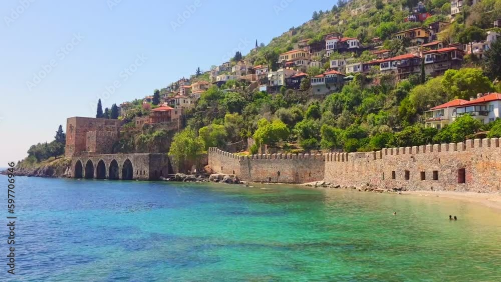 Wall mural ancient shipyard near kizil kule red tower in alanya, antalya, turkey