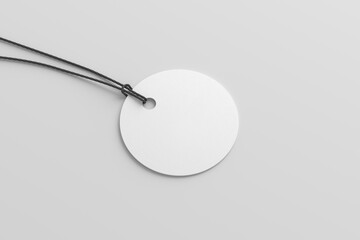 White round tag mockup on white background. Side view