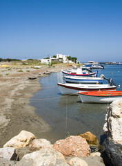 Tranquil scene os small fishing rboats in the harbor of Skyros island , Greece
