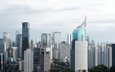 Fototapeta na wymiar Jakarta city skyline, Cityscapes with BNI 46 tower as a landmark