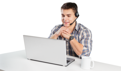 Happy consultant with headset looking at laptop computer