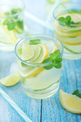 Glasses with lemon and lime lemonade	