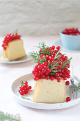 A biscuit decorated with red currant