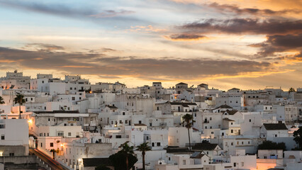Fototapeta na wymiar Beautiful Andalusian Pueblo Blanco (white village) at sunset. Vejer de la Frontera is one of the most beautiful Pueblos Blancos in Cádiz province, Andalusia, Spain.