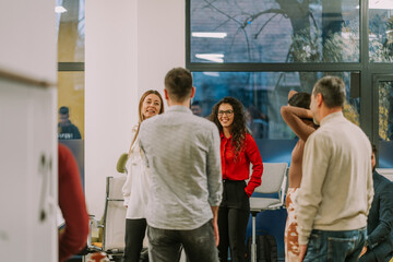 Group of people having fun conversation at the end of the shift