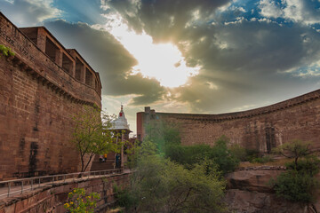 ancient fort with dramatic bright sunset sky at evening